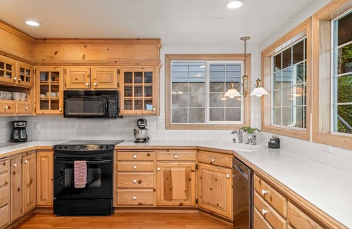 Dunes City House | New Listing! Beautiful Lakefront home w/amazing lake views, private dock, hot tub, and gameroom