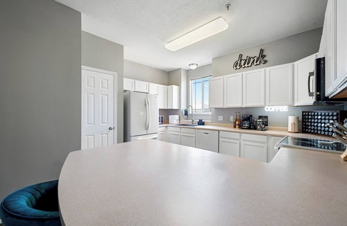 West Jordan Condo | NEW! Stylish, Bright, Open, Mountain Views, King Beds, Fireplace, Two Balconies!