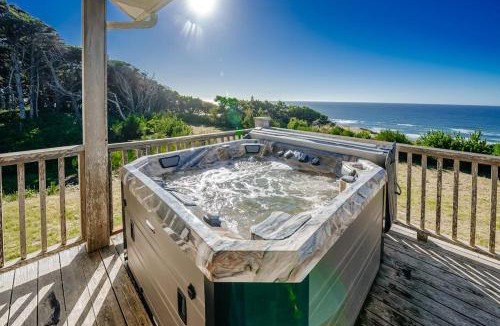 Newport House | Ocean view home withhuge deck & yard hot tub firepit & game room - dogs OK