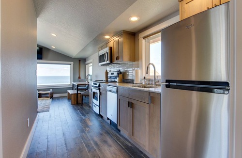 Oceanside Condo | Oceanfront overlooking Three Arch Rocks
