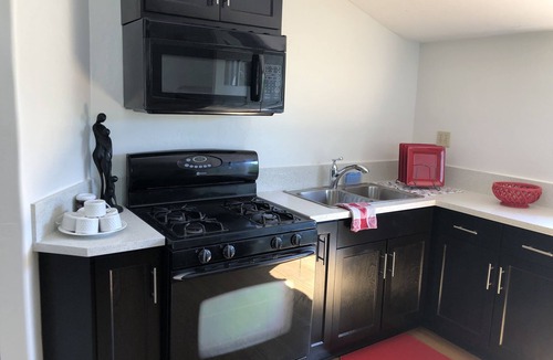 Downey Apartment | Private property beautifully landscaped and pool with a 2 bed 1 ba unit