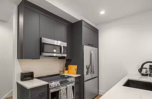 Mann House | Quaint Town Home with A/C, shared outdoor space