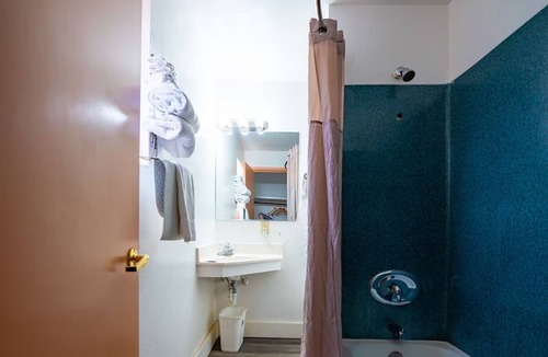 Madras Hotel | Relax After Exploring Local Attractions at a Quiet Room w/King Bed