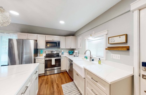 Netarts House | Renovated dog friendly cottage with a covered porch deck yard and washer dryer