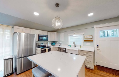 Netarts House | Renovated dog friendly cottage with a covered porch deck yard and washer dryer