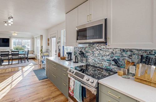 Stevenson House | Renovated home in central location with hot tub, theater, fast wifi & work desks