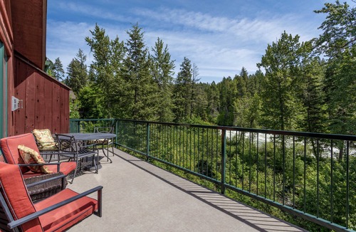 Bigfork Condo | Riverfront Bigfork Condo w/AC - Steps to Downtown, Stunning Swan River Views & Fireplace
