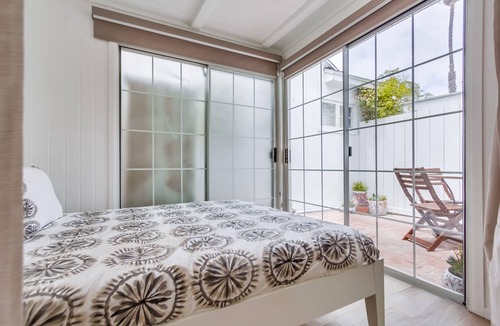 Beach Barber Tract Apartment | Sandcastle Hideaway, Dog Friendly, Designer Studio, Private Patio And Parking!