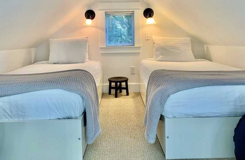 Seabrook House | Seabrook's Slack Tide, a cozy loft style cabin in Beach Camp!