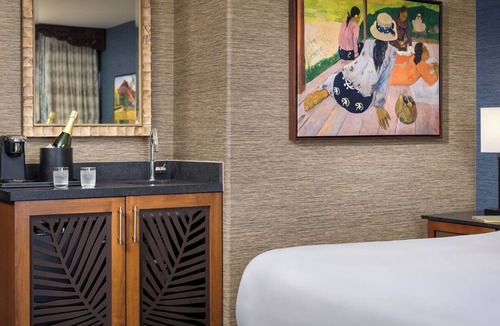 Crown Point Hotel | Spacious Bayfront King Suite | Relax at Catamaran Resort