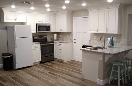 Enoch Apartment | Spacious Suite: Basement Apartment