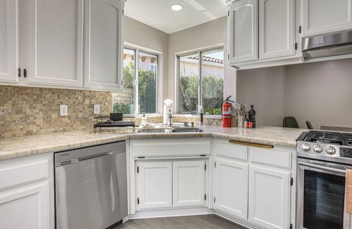 Victorville Cottage | Spring Valley Lake Home w/Desk & Fenced Yard