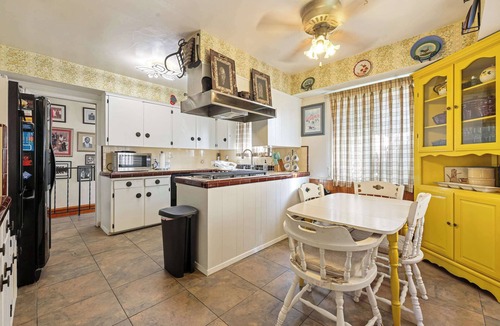 Oak Park House | Stay at Grandmas Entire Home with Yard & Balcony