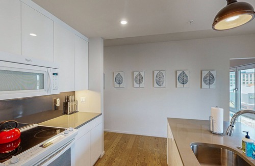 Uptown Condo | Sunny Condo in New Building with Great Walkable Locale