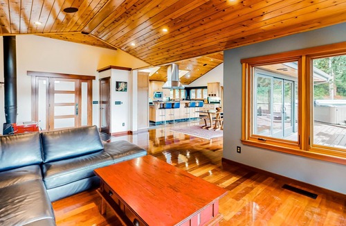 McKinleyville House | Tranquil and luxe river stay with wraparound deck, hot tub, sauna, & mtn views