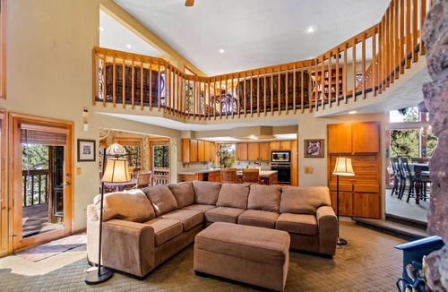 Liberty Lake House | Unique lakefront hideaway with four decks, dock, private hot tub & wood stove