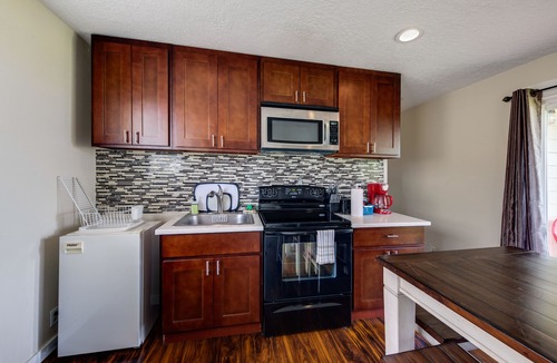 Lincoln City Condo | Upper Level Condo with Private Balcony & Nearby Beach Access - Dog-Friendly