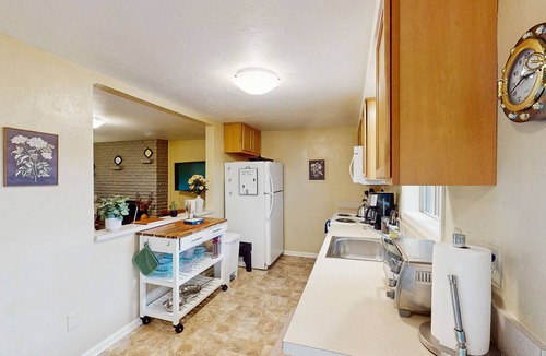 Friendly Condo | Upper level of duplex with a large deck & mountain view - dog friendly for 1 dog