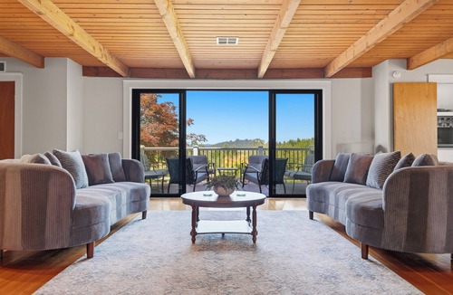 Carlton House | Vintage 1BR guest suite with king bed, fireplace, kitchenette, hot tub & patio