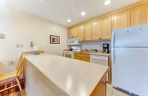Historic Bayfront Condo | Waterfront Condo with Private Deck, Bay Views, Pool, Hot Tub, & Sauna