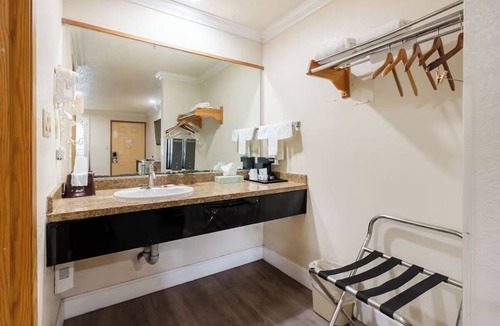Corcoran Hotel | Welcoming Guest Room with Private Bath and Microwave, Perfect for Quick Escapes