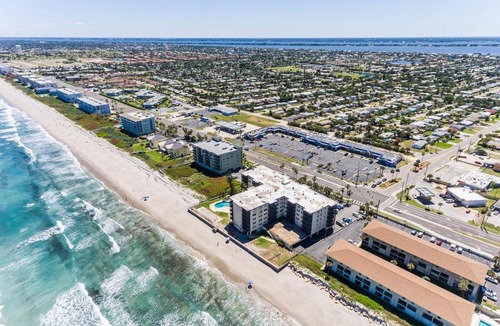 South Patrick Shores Apartment | You cannot get any closer to the beach! 2BR condo