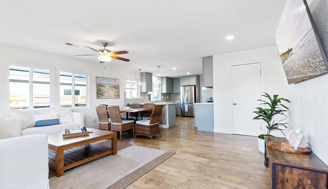 1.5 miles the beach. Walk to the Pier! Parking and private backyard. Game room