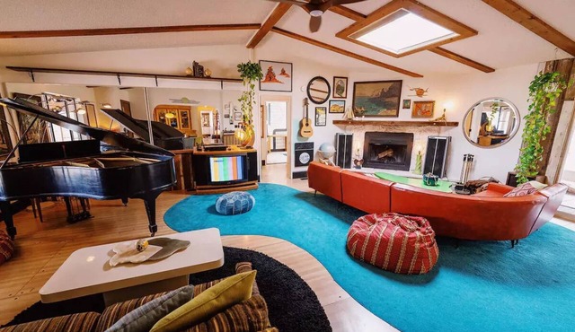 80s dreamworld with waterfall lagoon, bowling lane, hot tub under the Milky Way
