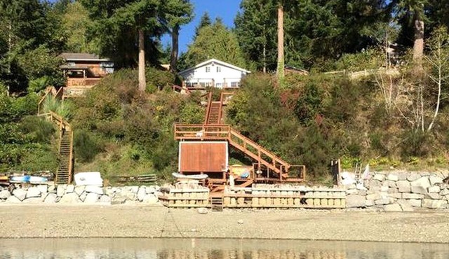 Amazing Sunrise at Coastal Luxury Cabin Rental on Herron Island with Fire Pit and Paddle Boarding near Olympia, Washington