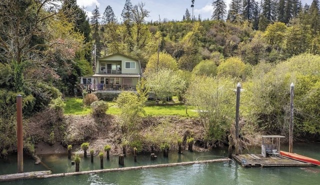 Charming home on the Siuslaw River with a fire pit, WiFi, & W&D