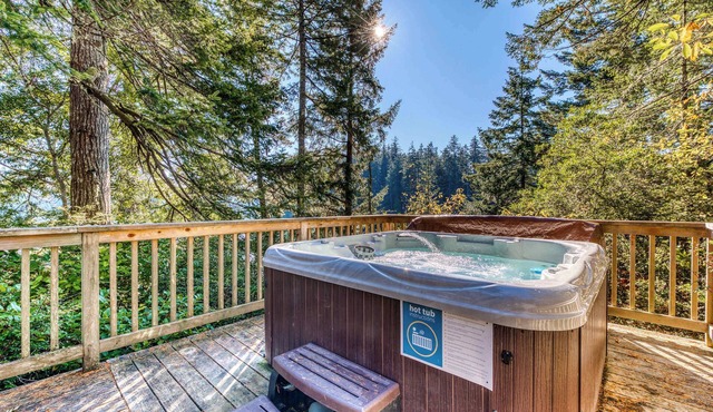 Dog-Friendly Home with Expansive Deck with Hot Tub and Dock on Woahink Lake