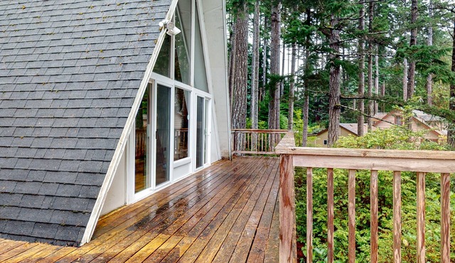 Dog-Friendly Home with Expansive Deck with Hot Tub and Dock on Woahink Lake