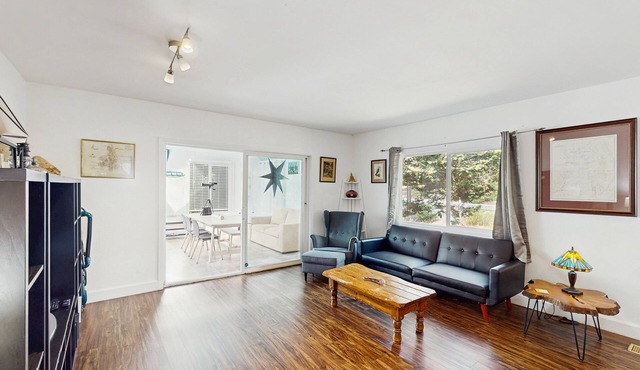 Dog-friendly, riverfront home with WiFi, deck & private washer/dryer