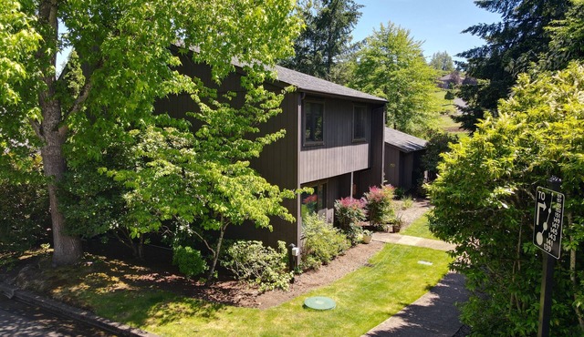Elegant Townhome, park-like setting. Local event transportation provided.