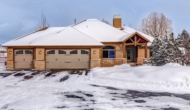 Enchanting dog-friendly home with hot tub, game room, fireplace, & washer/dryer