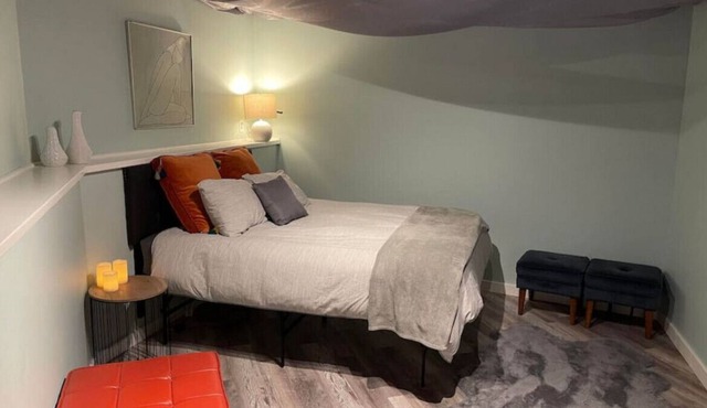 Geodesic Dome bedroom with shared cedar hot tub