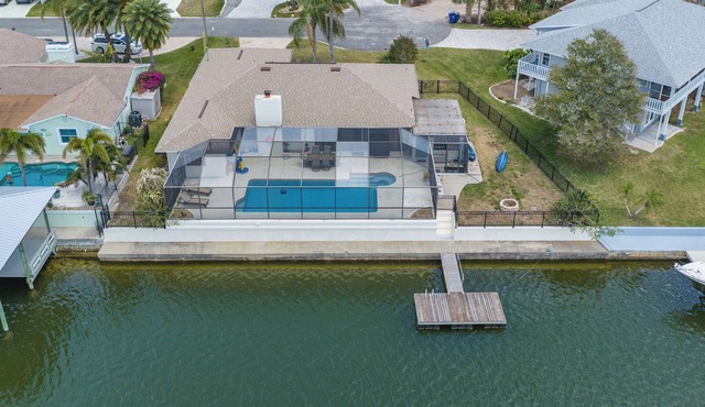 Inviting 4-bedroom house with pool on deep water canal in Hernando Beach
