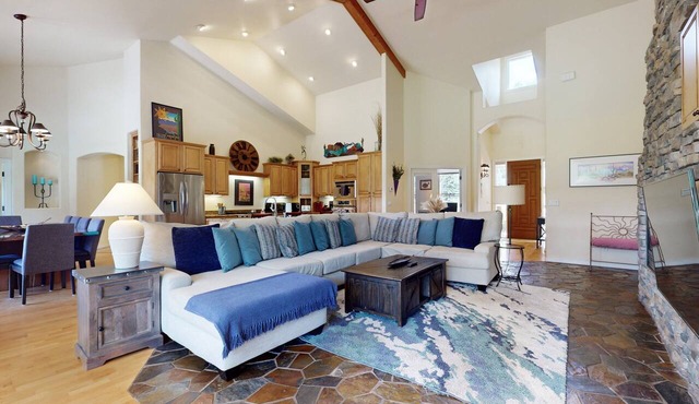 Lavish home with dual living areas & golf course views near skiing and dining