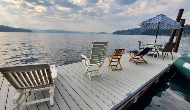 Private lakeside A-frame cabin w/hot tub, beach, docks, games. 4 season fun!