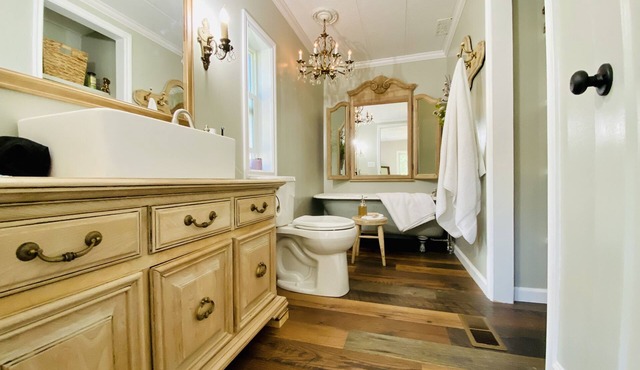 Riverfront Gem with Big Deck, Fishing & Adventure. Comfy beds, upgraded beauty