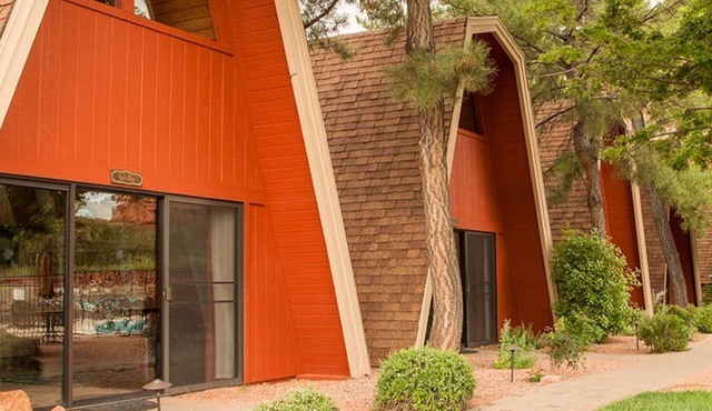 Sedona Chalet by pool with red rock views.