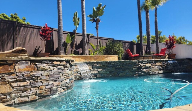 Soak in the sun with an outdoor entertainment area/pool/spa in relaxing Carlsbad