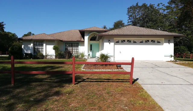 Spacious and comfortable home with heated pool .