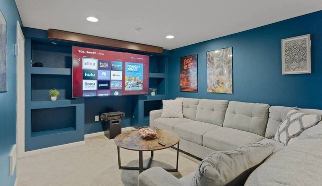 Spokane retreat with hot tub + theater room—sleeps 8! Pets OK