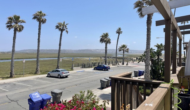 Updated Beach Bungalow 2bd/1 bath steps from beach with private balcony