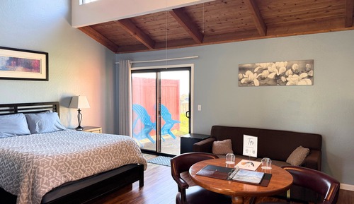 Large End Room with Queen Bed and Sofa, Limited Ocean View