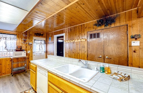 Whispering Forest House | Wilderness retreat with woodstove, game room, jetted tub, & mountain views